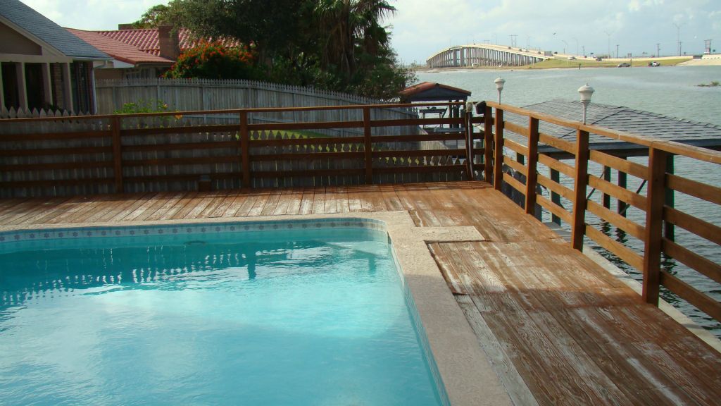 EXISTING WOOD DECK, CONCRETE STEPS and FLATWORK, HANDRAILS, BULKHEAD, STAIRS and POOL to be REPLACED